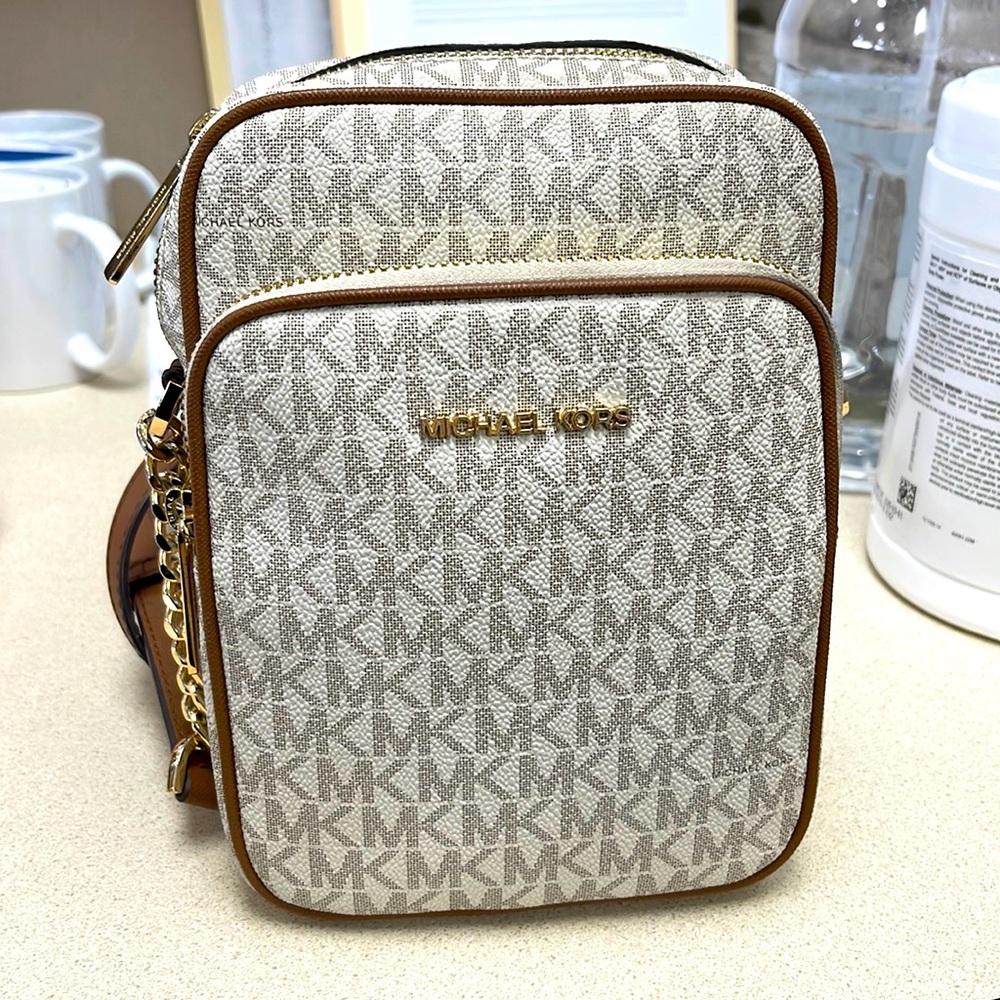 White, beige and brown Michael kors bag